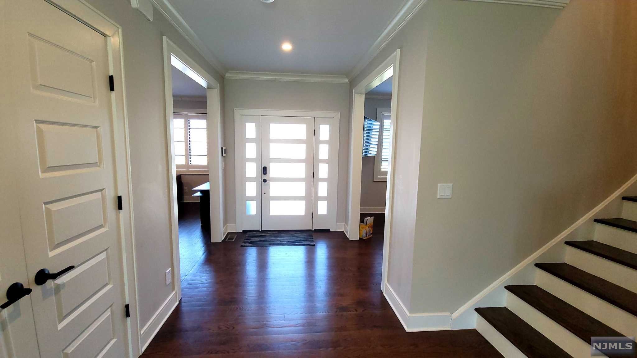 Two-year young, luxurious new construction, farm-house style featuring approx. 3600 s.f of livable space. . Modern Elegant & featuring an Open Floor plan flooded w/Natural Light. Gourmet Kitchen w/Center Island & Bar Seating highlights Quartz Counters, Top of the Line Appliances, Wine/Beverage Bar, Walk-In Pantry & Dining Area opens to a Covered Trex Deck. MBR Suite with Tray Ceiling, a huge WIC & Luxurious mBath. Full Finished Basement includes Rec Room, BR/Office & Full Bath. Other Amenities: Bud Vac, Prewired Alarm System & Prewired Speakers in Family Room. Private Fenced Property w/Paver Patio is Professionally Landscaped complete w/Irrigation System & protected by a Generac BackUp Generator. Close to Schools, Shopping & GW Bridge.