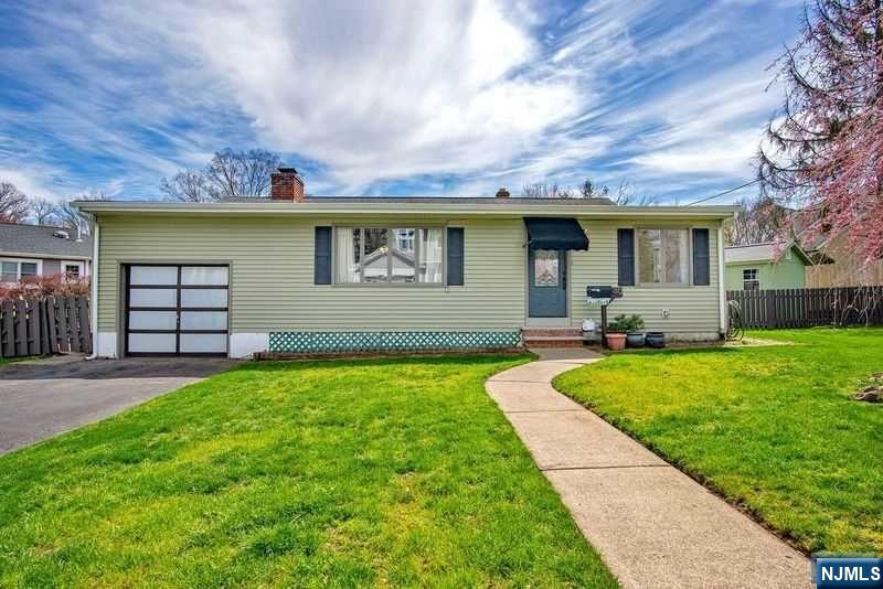 Welcome to 40 Beechwood! Features a bright living room with a fireplace, 4 bedrooms, 2 full baths and a finished basement. A great opportunity on Cresskill West Hill. This home is conveniently located near top schools, pool, parks, restaurants, and transportation.