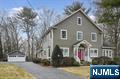 Move in & enjoy this 4 BR, 2.5 bath colonial in the desirable Knolls section of Wyckoff.Warmth,character & enormous curb appeal will welcome you to this exceptional home.The gracious EF is flanked by FDR w/bowed window seat & leaded glass accent & LR w/WB fpl & built-in cabinetry.Renovated chefâ€™s kitchen boasts quartz counters,cherry cabinets & high end appls incl Bertazzoni range,Sub-Zero fridge & Bosch DW.Kitchen opens to FR where you can bring the outdoors in thru french doors to a covered deck & bluestone patio.Back inside,a lrge den/home office,PR,laundry & mudrm entrance complete the 1st level.Upstairs find 4 generously sized BRs w/primary suite offering a WIC + dble closets & a large full bth w/jetted tub.Lower level has enormous potential adding to the almost 2900 SF.This classic home,full of stunning architectural details,is situated on an expansive 245â€™ deep property w/fully fenced,flat yard.The location is superb-close to schools,library,shopping,dining & transporta