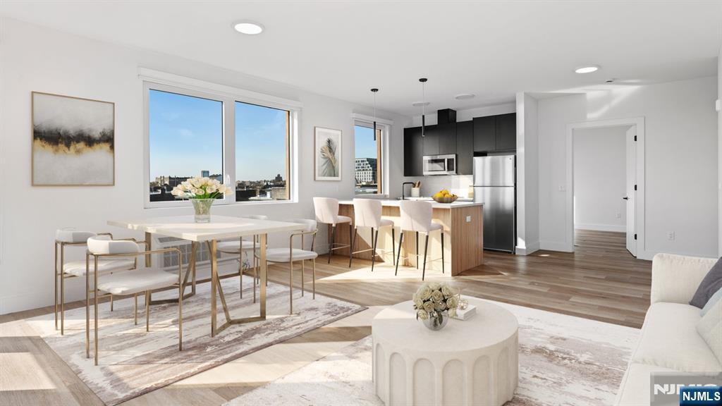 Welcome to Iron Pointe, where modern design meets unmatched urban living. This rare gem boasts a very large 2-bedroom, 1-bathroom residence spanning over 1,000 square feet, offering ample space and comfort. Nestled at 39-41 Madison St., this brand-new development is a standout in Newark's vibrant Ironbound section. With just a few exclusive units remaining, now is the time to claim your slice of this dynamic community. Whether commuting to NYC via Newark Penn Station or the Harrison PATH Station, you're just 20 minutes away from Manhattan by train.At Iron Pointe, you'll find more than just a home you'll discover a lifestyle. Choose from a selection of 1- and 2-bedroom residences, each meticulously designed with high-end finishes, sleek modern layouts, and top-tier appliances. Enjoy the ultimate convenience of in-unit laundry, along with the peace of mind of our pet-friendly policy.
