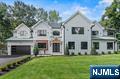 Experience the epitome of modern luxury in this brand-new construction , boasting 5,000 square feet of exquisite design in the highly desirable Upper Saddle River. Enter through the stunning two-story foyer, which leads to the expansive living room. Featuring a fireplace and abundant natural light, the living room exudes warmth and style with its beautiful heated engineering hardwood floors. The elegant dining room and kitchen island are designed for effortless entertaining. The first floor also includes a mudroom, a guest room, and one and a half baths, ensuring both comfort and privacy for your visitors. The second floor features four bedrooms and three full baths, along with a convenient laundry room. Unwind in the luxurious primary suite, which boasts vaulted ceilings, an expansive walk-in closet, and an opulent primary bathroom with heated floors. The outdoor space includes a two-car garage,a heated pool, and a massive backyard,making it perfect for relaxation and entertainin