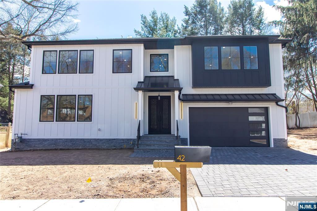 Welcome to this brand-new construction of modern residence that seamlessly blends sleek design with cutting-edge technology. Located in one of Closterâ€™s most desirable neighborhoods, this immaculate home offers the perfect balance of elegance, comfort, and innovation. Enter through a striking double-height foyer and living room flooded with natural lightâ€”an inviting space ideal for both entertaining and relaxing. This home features a state-of-the-art smart living system, integrating lighting, climate control, and door locks at the touch of a button or voice command. High-end finishes include wide-plank hardwood floors, oversized picture windows, and a cozy fireplace. The gourmet kitchen showcases premium Thermador appliancesâ€”including a double-door refrigerator, cooking stove, microwave, and ovenâ€”quartz countertops, custom cabinetry, and a spacious center island. A separate butlerâ€™s pantry adds style and function. The elegant dining room is perfect for both intimate dinners and lively gatherings, complete with a built-in wine cooler to keep your favorite vintages ready to serve. Upstairs, unwind in the luxurious primary suite, featuring a spa-inspired bath with soaking tub, rain shower, radiant heated floors, and a custom walk-in closet. Additional bedrooms are generously sized, each with en-suite baths and modern detailing. This one-of-a-kind home redefines contemporary living. Donâ€™t miss your chance to experience elevated luxury in the heart of Closter, New Jers