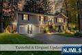 Surrounded by Mature Plantings & set in quiet Cul de Sac, this beautifully maintained residence w 5 Beds & 3 Full Baths offers many desirable Lifestyle Amenities & Easy NYC Commute. Striking Entry w Wide Brick Staircase, Pendant Light & Beveled Glass Door hints Elegant Interior. Circular flow is a perfect Entertainment Setting. Living Rm w Triple Picture Window transitions to Dining Rm w French Drs. Outstanding Family Rm w Clerestory Windows, Cath Ceiling, Skylights & Fan offers convenient access to beautiful Tiered Deck for BBQing & Hosting. Kitchen boasts Peninsula Seating, SS Apps, Dbl Oven, Buffet Serving Station & Eat-In Area w Skylight for Priceless Daily Meals. Prim Bedrm w 3 Closets, Prim Bath w Vaulted Ceiling, 2 Bedrms & Hall Bath complete Upper Level. Lower Level offers Private Guest Suite Setting w 2nd Fam Rm w Frplc, Full Bath, 2 Bedrms w Tons of Storage, Full Size Windows & Priv Exit to Yard. Nearby is Garage Access & Laundry. New Driveway, RO System, School Bussing