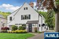 Experience the best of Ho-Ho-Kus in this beautifully updated Cheelcroft Tudor, where classic charm meets modern living. This stunning 4-bedroom, 2.5-bathroom Tudor has been meticulously renovated to offer an exceptional lifestyle. Close proximity to the quintessential town, convenient transportation, and excellent schools, this home is perfectly situated. As you step through the brick entryway, you'll be welcomed into a formal living room featuring a cozy fireplace and an adjoining sunroom/office, perfect for work or relaxation. The elegant dining room boasts lovely built-ins and a custom bar cabinet, ideal for entertaining, while the custom kitchen is equipped with professional-grade appliances and radiant heated floors. Enter the expansive great room, which features a gas fireplace, stereo surround sound, radiant heated floors, and sliders leading to the serene back patio. The first floor also includes a laundry room and a versatile bonus room. Upstairs, you'll find the luxurious primary suite, along with three additional bedrooms and a full bathroom. The third floor offers a private retreat with an office, play space, and ample storage. Additional features include central air, a 6-zone heating system, copper leaders and gutters, a sprinkler system, and a whole-house generator, ensuring comfort and convenience throughout the year. Don't miss the opportunity to own this picturesque home in a prime location!