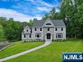 HIGH QUALITY, COMPLETE RENOVATION AT THE END OF A HIGHLY SOUGHT-AFTER CUL-DE-SAC IN A RESORT-STYLE SETTING! This stunning residence boasts 5 BRs w/one suite on the main level. Updates incl: NEW KITCHEN,BATHS,WINDOWS,HVAC,SECURITY,UTILITIES,MOLDINGS,GARAGE DOORS + SMART HOUSE READY to add exterior CAMERAS, SECURITY, SOUND++! NEW 4" Oak HW & Tile floors, NEW MULTI-LEVEL TREX-TYPE DECK to OVERSIZED, FREEFORM POOL/SPA w/new paver decking/equipmnt - a True Oasis! Oversized 2+ Car Garage(extra wide + approx 28â€™ deep!) Hardyplank, Stone & Cedar Exterior. Inside: Entertain in your Front to Back sophisticated GREAT ROOM w/modern Fireplace & Soaring Cathedral Shiplap Ceiling! DR w/Elegant Coffered Ceiling, Kitchen showcases a striking QUARTZ WATERFALL ISLAND & Countertops,Subway Tile Backsplash w/under counter lighting,SS Appliances & Sliders to HUGE DECK w/gas line for BBQ! 4 BRs & Lndry upstairs, Fin Basement w/Full Bth and garage access. NEW 2Z Heat & AC, Front & Back Sprinklers + meti