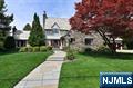 Breathtaking Tudor Manor meticulously renovated by renowned architect offering the perfect blend of timeless elegance & modern luxury. Set in the heart of Cheelcroft, one of the area's most sought-after neighborhood's. 6 1/2 stunning Bath Rms & 4+ BRs, 3 of which have ensuites. Every inch of this home exudes sophistication & thoughtful design. Custom millwork. 4 gas fpls. Expansive K & Gr Rm with soaring ceiling & charming balcony. Unparalleled Library features exposed-beam ceiling & gas fpl providing a dramatic & inspiring retreat perfect for work or quiet reflection. Custom pub-style bar, wine cellar, sauna, exer.rm, FB, playroom & framed for possible future elevator. Over 5000 SF of living space. Beautifully-landscaped, resort-inspired oasis with heated IG gunite pool, hot tub, exceptional O/D K, bluestone patios & exquisite gas fpl. Generator. Award-winning schools. This is not just a home-it is a legacy property for generations to come. Schedule your private visit today!