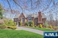 Magnificent 5BR, 6 & 1/2 Bath Colonial Manor, well-located on a prime, quiet, cul-de-sac street. Features a striking marble EF w/graceful staircase w/dbl height ceiling & view to the 2nd FL loft. Huge, well-equipped MEIK. Expansive sundrenched GR w/vaulted ceiling, gorgeous oversized leaded windows, and soaring stone FPL. Handsome Off/Library w/coffered ceiling, BI wet bar, and FPL. Appealing layout showcasing thoughtful details, tasteful updates, exceptional millwork, and comfortable, functional, generously proportioned rooms, including a desirable separate main FL Off/Bonus Rm/FB. Elegant PBR Suite, w/FPL, 2 WI closets, & lux PBTH w/double vanities, soaker tub & steam shower. Full, nicely finished WO LL w/lg FR/Game Rm/BI storage/fridge, Play/Exercise Rm, Ensuite BR/FB, & lg laundry/FB combo. Multiple decks and patios to enjoy the lush, private, backyard oasis, featuring htd pool w/waterfall & mature prof. landscaping. Garage for 3 vehicles. Close to everything! The list goes on!