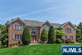 Stately brick colonial nestled on a quiet cul-de-sac, offering an exceptional floor plan. A grand two-story entry leads to a banquet sized dining room, formal living room & a sunken great room with soaring ceilings, skylights & a wood-burning fireplace. The spacious eat-in kitchen features a large center island, high end appliances & a slider to the newer Trex deck, perfect for entertaining. A large 1st floor office or den, laundry/mudroom, power room & access to the 3 car garage adds to everyday convenience. Upstairs youâ€™ll find 5 generous bedrooms, including a primary suite with 2 custom walk-in. closets and a junior ensuite with tray ceiling. The finished walk-out lower level includes a large rec room, full bath and possible 6th bedroom. Beautifully manicured property in a fantastic location with access to top rated schools, parks, shopping, transportation & more!