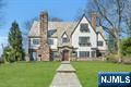 Sophisticated Luxury-Perched high on Crest Rd in Ridgewoodâ€™s sought-after Heights section, this stunning Tudor boasts breathtaking NYC skyline views and incredible sunrises. Extensively renovated in 2013-2014, this masterpiece is a collaboration btw architect Roger Schlicht of RDS Architects, Ulrich, Inc., & Karen Weidner Design, blending classic elegance w/ modern luxury.Boasting 7 BRs, 4 FBs & 2 HBs, 6 gas FPLs, office, HW floors, & exquisite architectural details throughout. The Ulrich custom kitchen features top-tier appliances & Calacatta gold marble opening to a vaulted family rm w/ grand FPL.The lower lvl is an entertainerâ€™s dream w/ a custom bar, media rm & pub rm, wine cellar & more! Professionally Landscaped private grounds spanning over an acre. Bluestone patios create an idyllic setting to enjoy Ridgewoodâ€™s 4th of July fireworks w/spectacular views.3car attach garage/ generator.Blocks from town, schools, & NYC trains, this turn-key estate offers a rare & refined lifestyle.
