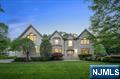 Welcome to this exquisite 5BR, 5.2BTH custom all-brick manor tucked away on a peaceful Upper Saddle River double cul-de-sac. A Belgium block drive & paver walkway lead to a soaring 2-sty entry with heated limestone floors & an elegant sweeping staircase. French doors open to a cozy library w/built-ins & marble fireplaceâ€”perfect for work or quiet moments. The elegant formal dining room w/custom woodwork & walnut inlay sets the stage for memorable gatherings. The butlers pantry leads into the newly renovated chef's kitchen with Wolf 36" gas range, Miele double ovens, 2 Miele DWs & Subzero refrigerator that flows into a sunny breakfast area. Host family gatherings in the breathtaking 2-story great room with stone fireplace, wet bar, bev fridge and sliders to the gorgeous backyard. The main level also offers a walk-in pantry, a spacious laundry room, powder rm, mudrm w/built-ins, guest BR and FB. Upstairs, the spacious primary suite features two walk-in closets, spa-like bath & an ensuite office/bonus room. No one has to share with 3 more ensuite bedrms completing this level. The amazing lower level has it allâ€”an entertaining area which includes a wetbar w/ fridge, sink, dishwasher, a rec area for games, a TV area w/ fireplace, plus a bonus room, gym and 1/2 bath, plenty of storage plus access to the 3-car heated garage. Outside enjoy entertaining with the spacious pavered patio and large fenced in yard plus for peace of mind a Generac generator. Your dream home is here!