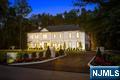 Relish in the Rare Opportunity to own NEW Construction in the prestigious Saddle River. Situated on a flat 2-acre ultra-private property on a quiet cul-de-sac street in the desirable Chestnut Ridge sectionâ€”this brand-new European-Inspired Colonial Estate boasts 8,500+SF of exquisite living on all floors- blending timeless architecture with the finest modern luxuries. Designed with the most exclusive Italian stone throughout and curated with expensive designer finishes, every detail reflects exceptional craftsmanship and sophistication. The residence showcases grand living spaces from the gorgeous entry foyer, large formal living room & stunning great room with soaring ceilings, gas fireplace & European windows. Enjoy the elegant chef's kitchen with the stunning Italian Quartzite island flowing into the adorned dining room with butler's pantry/bar, a formal powder room, walk-in pantry & the added convenience of a first floor bedroom en-suite. Upstairs, find 4 large bedroom en-suites in addition to the dreamy primary suite with balcony, large WICs & breathtaking bathroom with a dual entry, lit walk-in shower, designer bathtub, & heated floors. The finished lower level features the opportunity to customize as you wish with large open recreation space with potential for a theater, gym, & more. An unrivaled chance to live in private luxury in one of Bergen Countyâ€™s most exclusive addresses.