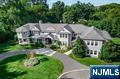 With immaculate renovations over the past year, this custom-built, 20-year-young Hampton-style colonial offers 7,290 SF of high-style design, and 360-degree privacy spanning over an acre of flat land. Recent upgrades include a new roof, smart home features, HVAC, driveway, generator, retaining walls, carpeting & foyer flooring, interior/exterior paint, landscaping enhancements, bathroom updates, and more! High-end everything in the updated custom kitchen with all luxury brand appliances, a 10-ft center island, a pantry/cellar, and a vaulted eat-in nook. Other notable 1st-floor features include a banquet-size dining room, living room/office, 2-story entry, family room with fireplace, and access to a screened porch and open deck spanning the back of the home. The 2nd level offers 5 bedrooms, all ensuite, including a primary retreat with fireplace & spa bath, plus a 2nd family room. Walk-out finished basement, home theatre, 3-car garage, and prime location in the Willard district.