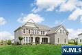 Set in the highly desirable Orchard Ridge community of Upper Saddle River, this custom built home offers a striking blend of sophistication and modern design. Only two years old, and much larger than it appears, this home defines elevated living with soaring ceilings, expansive sun-drenched spaces, and elegant finishes throughout. From the moment you step through the grand entrance, you're greeted by natural light pouring through oversized windows, highlighting the sleek design and open-concept layout. The heart of the home is the chefâ€™s kitchen outfitted with premium appliances, custom cabinetry, and a large island that seamlessly connects the living and dining areas. An entertainer's dream for sure! The primary suite is a true sanctuary, featuring two spacious custom walk-in closets and a spa-inspired ensuite bath. Additional bedrooms offer generous space, ensuite baths, and refined detailing. Step outside to your private backyard oasis, purposefully designed for entertaining. Whether hosting summer BBQs, relaxing with family/friends, or dining al fresco, the outdoor space offers both beautifully landscaped grounds and room to personalize your dream outdoor retreat. The owner has tastefully upgraded the home as well including upscale landscaping, high end custom closets, window treatments and more. With easy access to Upper Saddle River's top rated schools, dining, NYC transportation and the expansive property this extraordinary home is a rare opportunity.