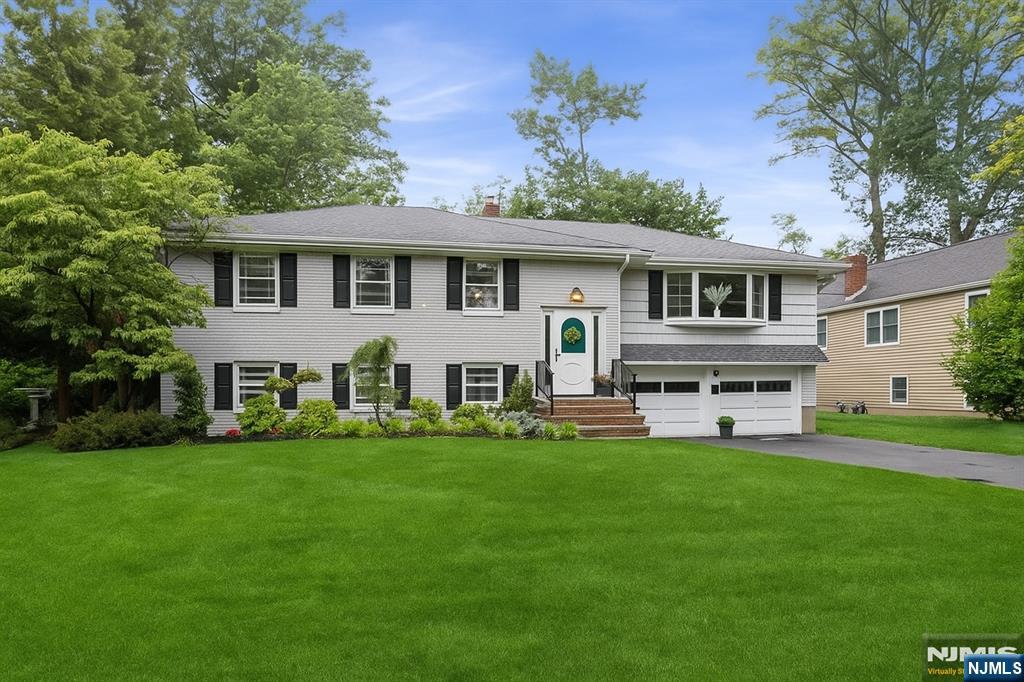 Conveniently located in Ramsey close to the NYC train, the High School, the farmer's market, and the vibrant town, this home is situated on one of the most sought after streets. With an open floor plan, work-from-home flexibility, and multigenerational living potential, itâ€™s thoughtfully designed to fit todayâ€™s lifestyle. The inviting family room features a cozy fireplace surrounded by custom built-in bookcases, while the sunlit living room showcases a beautiful picture window with serene neighborhood views. Upstairs features hardwood floors throughout. The spacious lower-level suite offers privacy for extended family, guests, or au pair accommodations. Recent updates include a new heating system, new awning and gutters, a 10-year-old roof, and a 6-zone sprinkler system. Enjoy outdoor living on a generous deck overlooking the lush, landscaped backyardâ€”ideal for relaxing or entertaining. A rare opportunity to own clubside in Ramsey Golf and Country Club on a sought-after, quiet street with golf course views. Living in Ramsey Golf and Country Club means enjoying a lifestyle like no other. The Club features a scenic 18-hole golf course, lakefront pool and beach, paddle tennis, festive dining options, and a vibrant pool bar with food, music, and TVsâ€”offering year-round activities and fun for every generation. Membership required.