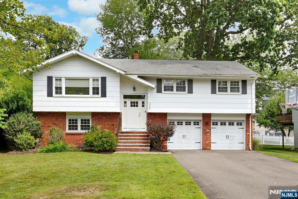 Welcome! With an easy commute to NYC and top-rated schools this is exactly where you want to be. Tucked into a sought-after neighborhood with this recently updated 4 bedroom, 2.5 bath bi-level offers both comfort and convenience on a peaceful street with a park-like setting. Step through the brand-new front door and landing into the main living space, where a spacious gathering room, formal dining area, and bright eat-in kitchen awaitâ€”complete with brand-new appliances and fixtures. Recently refinished hardwood floors and stairs add warmth and elegance throughout. The updated main bath serves two comfortable bedrooms, while the generous primary suite features a recently renovated full bath. The lower level, fully remodeled in 2022 with new tile, carpet, and trim, offers a versatile fourth bedroomâ€”perfect for guests or a home officeâ€”plus a spacious gathering room, an updated half bath, and a convenient laundry area. A large 2 garage completes the space, providing ample storage and functionality. This home is designed for todayâ€™s lifestyle with a Lutron lighting system, theater-quality surround sound in the gathering room, outdoor speakers, smart thermostats, keypad entry, and wiring for robust whole-home WiFi. Living in the Ramsey Country Club, residents enjoy access to the Ramsey Golf/Country Club, a rare blend of historic charm and premium amenities. From golf, racquet sports, and lakefront poolside lounging to elegant dining and a vibrant calendar of social events.