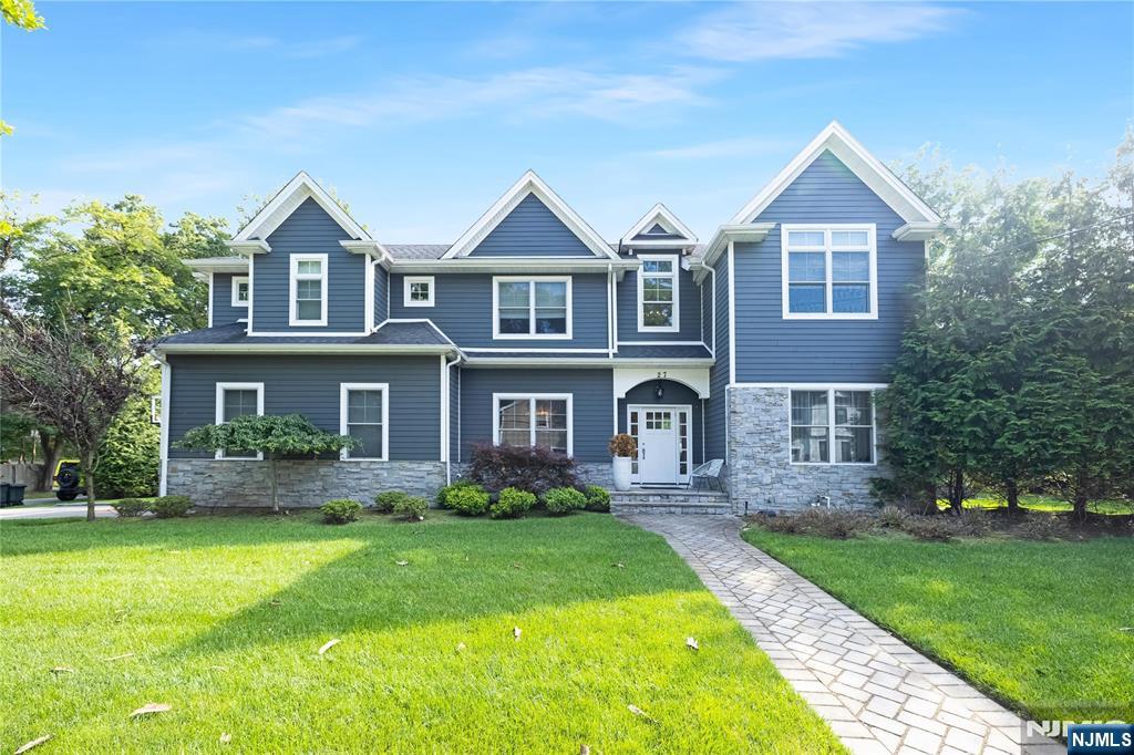 Welcome to 27 Central Avenue, Demarest, NJâ€”a distinguished residence offering an exceptional blend of comfort and sophistication. This expansive home features four bedrooms and five and a half bathrooms, providing ample space for family living and entertaining. The property is equipped with three zones of HVAC and multi-zone baseboard heating, ensuring optimal climate control throughout the year. The new foundation and state-of-the-art security system offer peace of mind and reliability. Culinary enthusiasts will appreciate the outdoor kitchen, complete with a fire pit and bar, perfect for hosting gatherings. Inside, the gas fireplace adds warmth and ambiance to the two-story family room, creating a welcoming atmosphere. The first floor boasts a stylish bar, ideal for entertaining guests. The basement is a versatile space, featuring a bonus office, a gym, and a second living room, catering to a variety of lifestyle needs. Stainless steel appliances in the kitchen ensure functionality and modernity. The multi-zone sprinkler system maintains the lush landscaping, enhancing the property's curb appeal. Located in the desirable community of Demarest, this home offers a harmonious blend of luxury and practicality. Experience the pinnacle of refined living at 27 Central Avenue, where every detail has been thoughtfully designed to meet the needs of discerning homeowners.