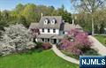 This stunning center hall colonial with over 5,500 square feet of living space is located in the heart of the Somerville School district and is a one-of-a-kind Ridgewood home. The home has been meticulously renovated by the current owners including the kitchen and primary suite addition. This home maintains the original charm but with a gourmet floorplan ideal for entertaining. Enter though the gracious center hall and move into the 32 foot long living room with 10' ceilings and large wood-burning fireplace the seamlessly connects to the modern family room, also featuring a fireplace. Both the family room and the bright and inviting sunroom connect to the deck and gourmet outdoor kitchen. The first floor also features a modern kitchen with cathedral ceiling, lots of natural light, a private dining area, butler pantry and first floor laundry. The dining room dates back to the 1760â€™s with the original fireplace. The second floor features four large bedrooms, all with stunning views of the grounds. The primary suite includes high ceilings, two walk-in closets, a primary bathroom and wood-burning fireplace. Donâ€™t miss the private suite located on the third floor which includes a bedroom, sitting room and full bath. This space is perfect for guests or a home-office. The home sits on three-quarters of an acre with an expansive lawn, inviting outdoor space, two-car garage and private circular driveway off John Street. Donâ€™t miss this chance to own a piece of Ridgewood history.