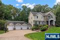 Beautifully upgraded thoughtfully laid-out luxury house, well-managed Center Hall Colonial located in dead-end(1AC). Large entry foyer, Living Room, formal over-sized dining room. Dining room leads to second sitting space w/fire place ideal for library/office. Spacious entry hallway opens to family room which looks over private, modern kitchen with island and 2nd sink area. Large walk-in pantry near the kitchen. Family room with sliding door to enclosed Sun Room. A wide deck surrounding both sides of the house. Master suite with 2 walk-in closets and an over-size full bathroom. Second biggest bedroom was originally two separate bedrooms and can be re-divided if desired. 2 more full bathrooms make the space comfortable for extended family. Fully-finished walk-out basement with recreation room, gym, wet bar, sitting area and a full bathroom. Huge storage rooms, mud Room exits to paved driveway, Oversized 3 car garage.