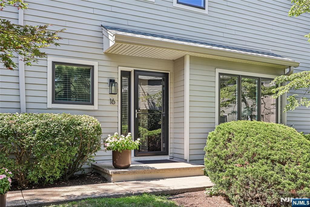 Don't miss this opportunity to live in this beautiful end unit townhouse at the end of the culdesac in the highly desirable community of Spruce Run. This spacious 3 bedroom, 2 1/2 bath home is filled with natural light and has an updated kitchen and baths. Great for entertaining or relaxing indoor or out - with a cozy family room with stone fireplace and a large deck that faces a small wooded area for privacy. The second floor features a primary bedroom suite with full bathroom/walk in shower, two walk-in closets and additional storage space along with two additional bedrooms, full bath, laundry and ample closets. The third floor finished loft space has endless possibilities as an extra bedroom, home office, home gym or bonus room. Enjoy the many upgrades: Pella windows, Graber blinds, New decks, Upgraded heat with additional furnace in crawl space, Recessed lighting, Updated fireplace with stone veneer, wood mantle and gas, Water softener. Roof was replaced 2yrs ago. Residents have the option to purchase a membership to the Ramsey Golf and Country Club. Prime Ramsey location near restaurants, shopping, schools, downtown, farmer's market and train station for commuting. Come make this your new home!