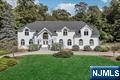 Welcome to 718 High Woods Drive, an exceptional residence set on a premier lot in one of Franklin Lakesâ€™ most sought-after locations. Custom-built by renowned Leonard Builders for the original owners and never before offered, this stately Center Hall Colonial is perched at the top of the street with hillside views, beautiful sunsets and privacy. Surrounded by significant homes ensures lasting value. A grand two-story foyer opens to sun-filled living spaces, including a soaring great room with walls of windows overlooking the private backyard oasis. The gourmet kitchen boasts high-end appliances, designed to delight both everyday cooks and passionate entertainers. With 5 bedrooms and 5 baths, the home offers a luxe primary suite with spa-like bath, a junior suite, two additional spacious bedrooms, and a convenient first-floor guest br/bth. Recent updates include new Hardie Plank and stone siding and a new roof, enhancing both curb appeal and peace of mind. The 1.33-acre property is a retreat in itself, featuring total privacy, a gunite pool, and circular paver driveway. The unfinished basement is a blank canvas, ideal for creating a gym, theater, or wine cellar, and comes plumbed for a full bath and potential kitchen-adding exceptional potential and value to the home. Blending timeless Colonial elegance with modern updates and resort-style amenities, this one-of-a-kind home presents a rare opportunity in a premier Franklin Lakes location.