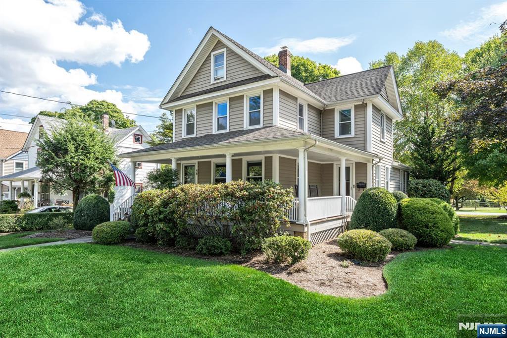 Walk to school, town & NYC transportation. Here you will find a Home Filled with Heart. This inviting 4-bedroom, 2.5-bath Victorian Colonial offers the perfect blend of character and comfort for todayâ€™s lifestyle. Imagine sipping lemonade with loved ones on the welcoming wrap-around porch, or gathering in spacious rooms filled with natural light, high ceilings, and gleaming hardwood floors. The finished walk-up attic is a versatile bonusâ€”great for a playroom, guest space, or quiet officeâ€”while the lower level recreation room is ideal for movie nights or indoor fun. Step outside to a backyard made for memories, complete with a Trex deck, bubbling hot tub, firepit lounge, and outdoor TV. A newly finished 2-car garage adds convenience, and with schools, shops, restaurants, and NYC transportation just a short stroll away, this home is ready to be the heart of your familyâ€™s story.
