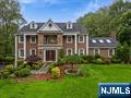 Stunning 4BR brick colonial on a quiet cul-de-sac in prestigious Upper Saddle River! Approx. 5,000 sq ft, fully renovated in 2019 by an award-winning architectâ€”classic elegance meets modern luxury. Features include a grand foyer with custom millwork, chefâ€™s kitchen with Sub-Zero/Wolf appliances, quartz counters, radiant heated floors, and wine bar. Skylit family room with vaulted ceiling and brick fireplace. Formal dining room and private office/library. Upstairs offers a luxurious primary suite with dressing room and spa-like bath, a junior suite with full bath, and two additional bedrooms with shared hall bath. Glass folding doors open to a large deck and heated in-ground pool surrounded by beautifully landscaped grounds. Finished walk-out basement ideal for gym, recreation, or media room. Recent upgrades include triple water filtration, completed well test, and a brand-new septic system just finished in 2025.Prime location minutes to Route 17 privacy, elegance, and convenience all in one!