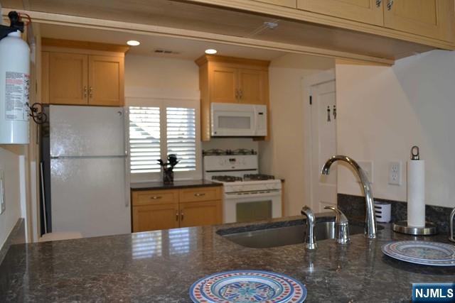Alt. view of Kitchen.File Photo