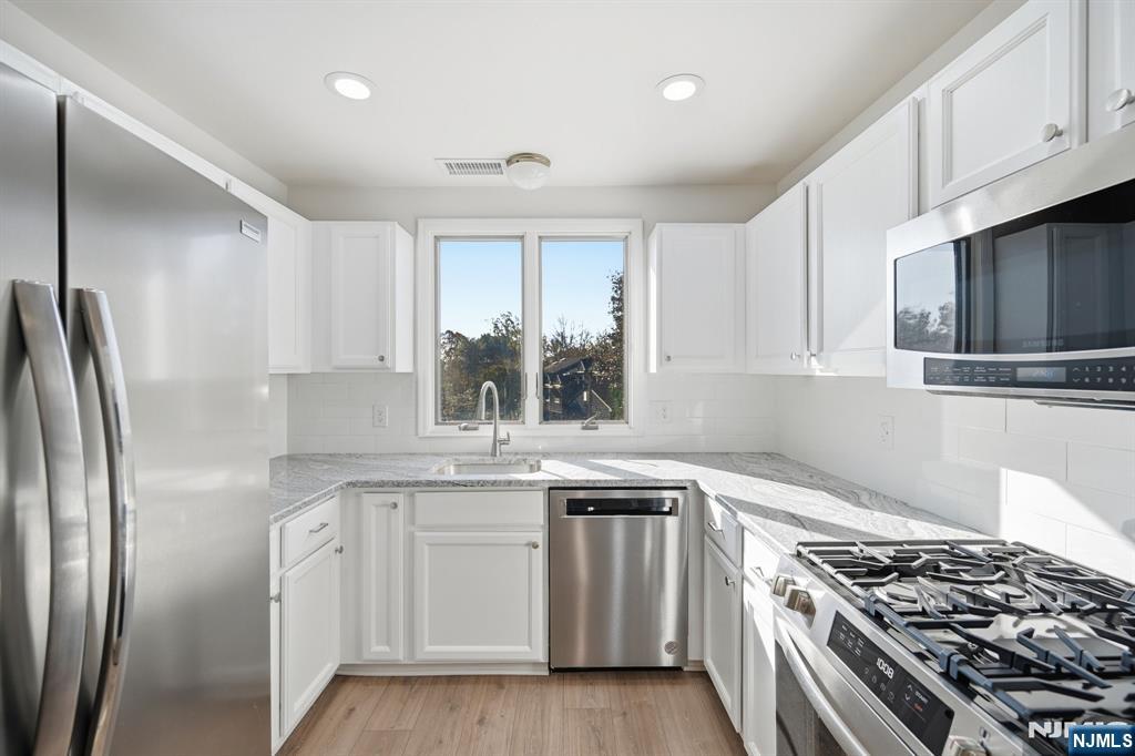 Homes for sale in Bloomingdale, NJ | 3 Mountain Ridge Rd, Bloomingdale, NJ 07403 | MLS# 26001552